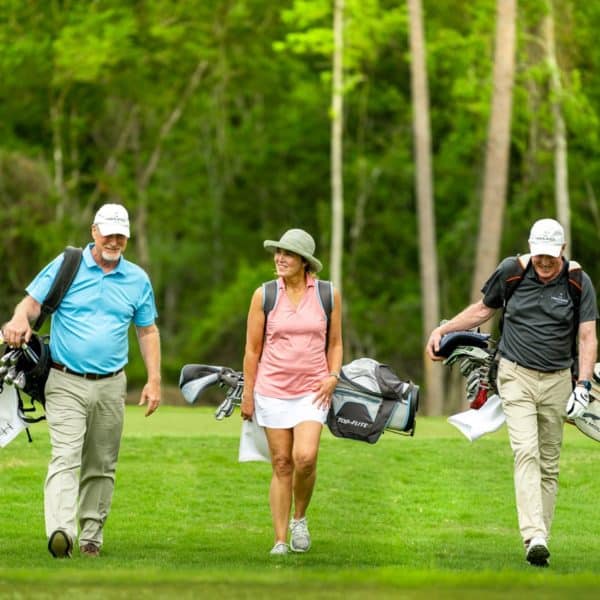 Players walking the course